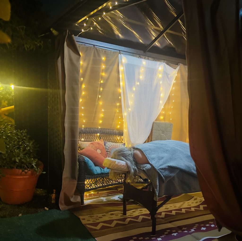 Client enjoying massage at night at Creative Chakra